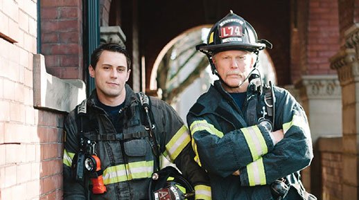 young man and retiring firefighter
